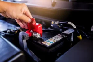 mechanic performing car battery replacement at Brock Auto Centre Kamloops BC