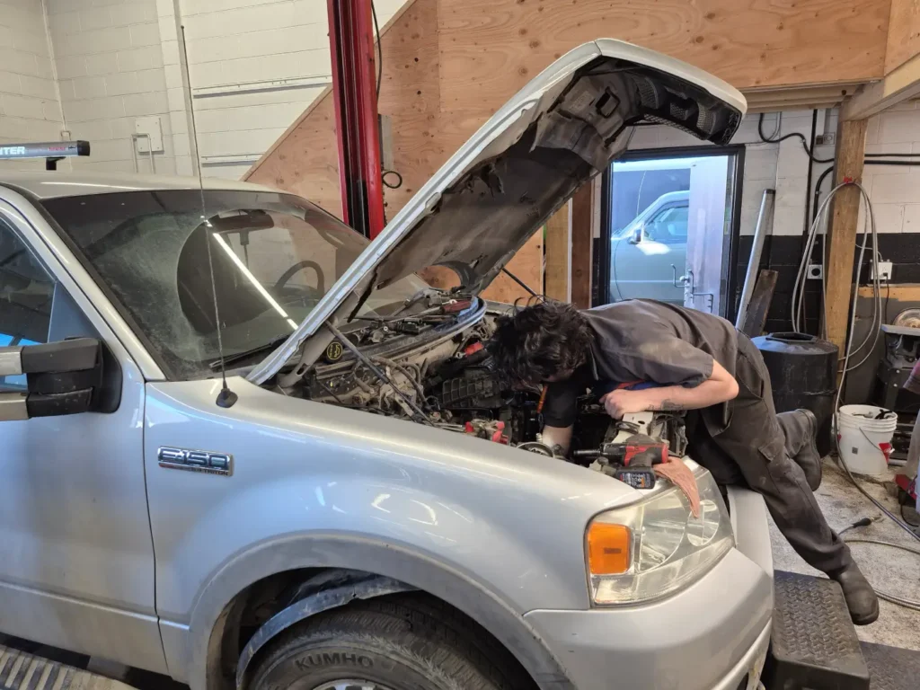 Working on an engine at Brock Auto Centre in Kamloops