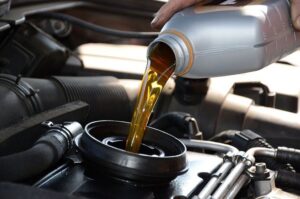 topping up the oil at Brock Auto Centre in Kamloops