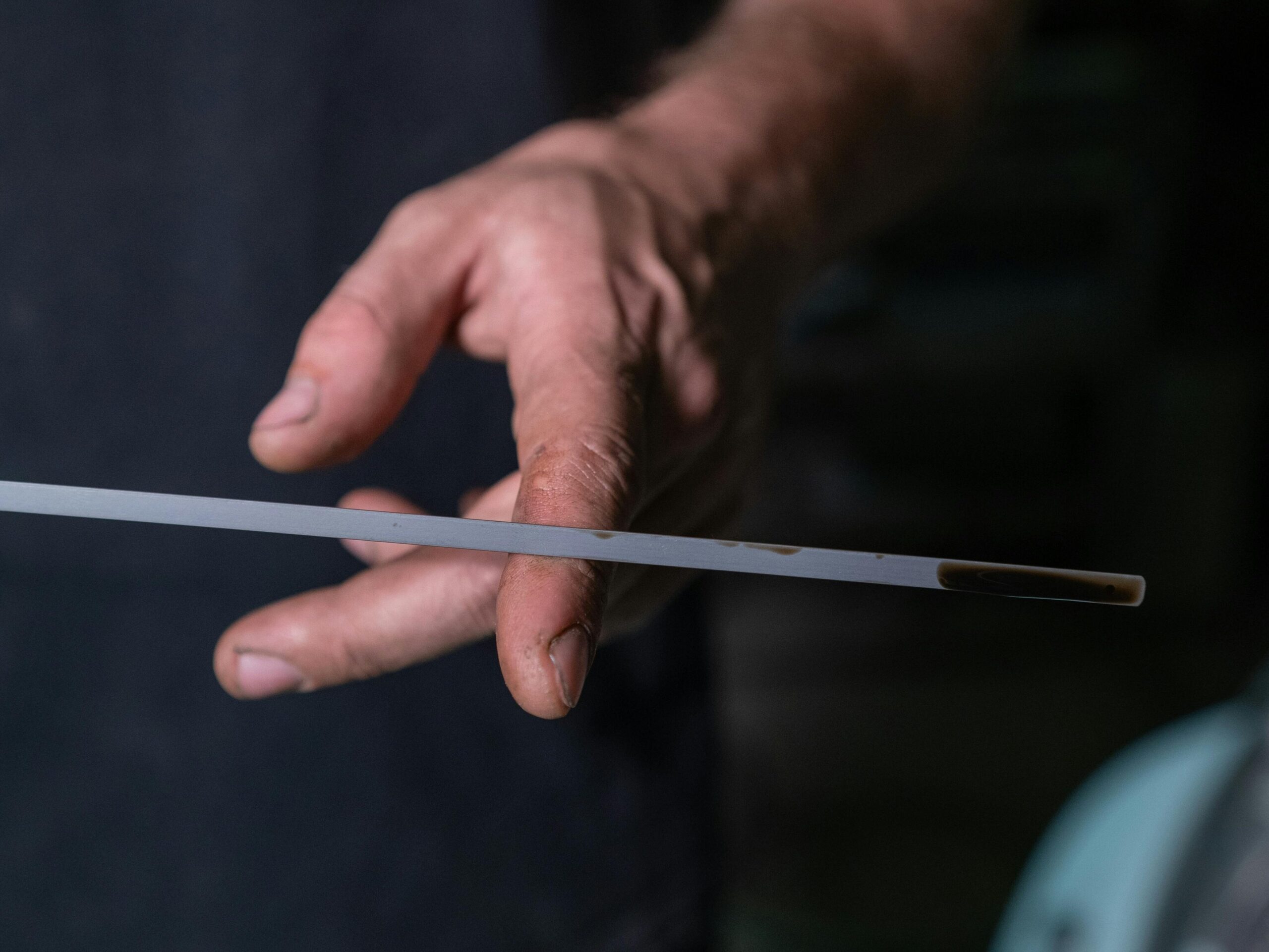checking oil dipstick for oil change service Kamloops BC