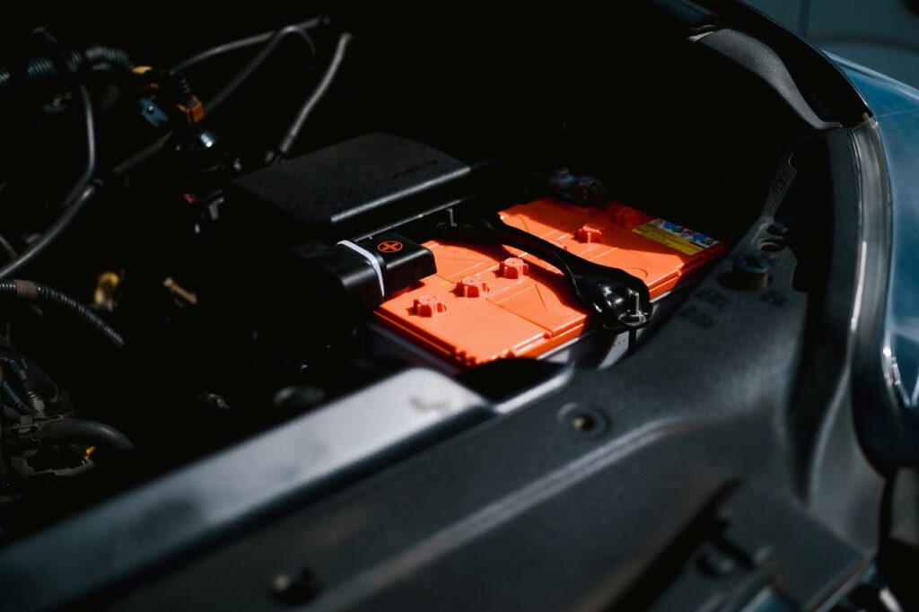 car battery terminals being cleaned during battery replacement service Kamloops