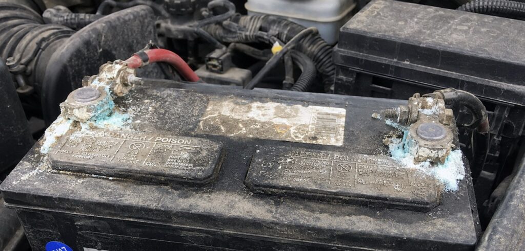 Car battery terminals showing corrosion buildup needing car battery replacement Kamloops